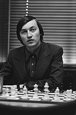 4e Ronde, Anatoli Karpov achter het schaakbord, Bestanddeelnr 930-5266.jpg