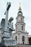 Tombstone with Angel and the bell tower.jpg